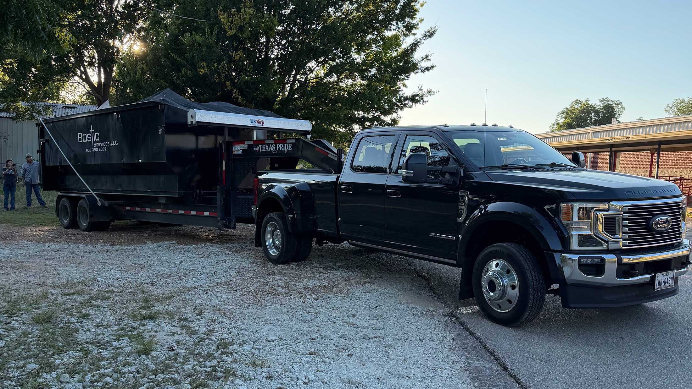 C3 Rentals roll-off dumpster delivery truck serving East Texas