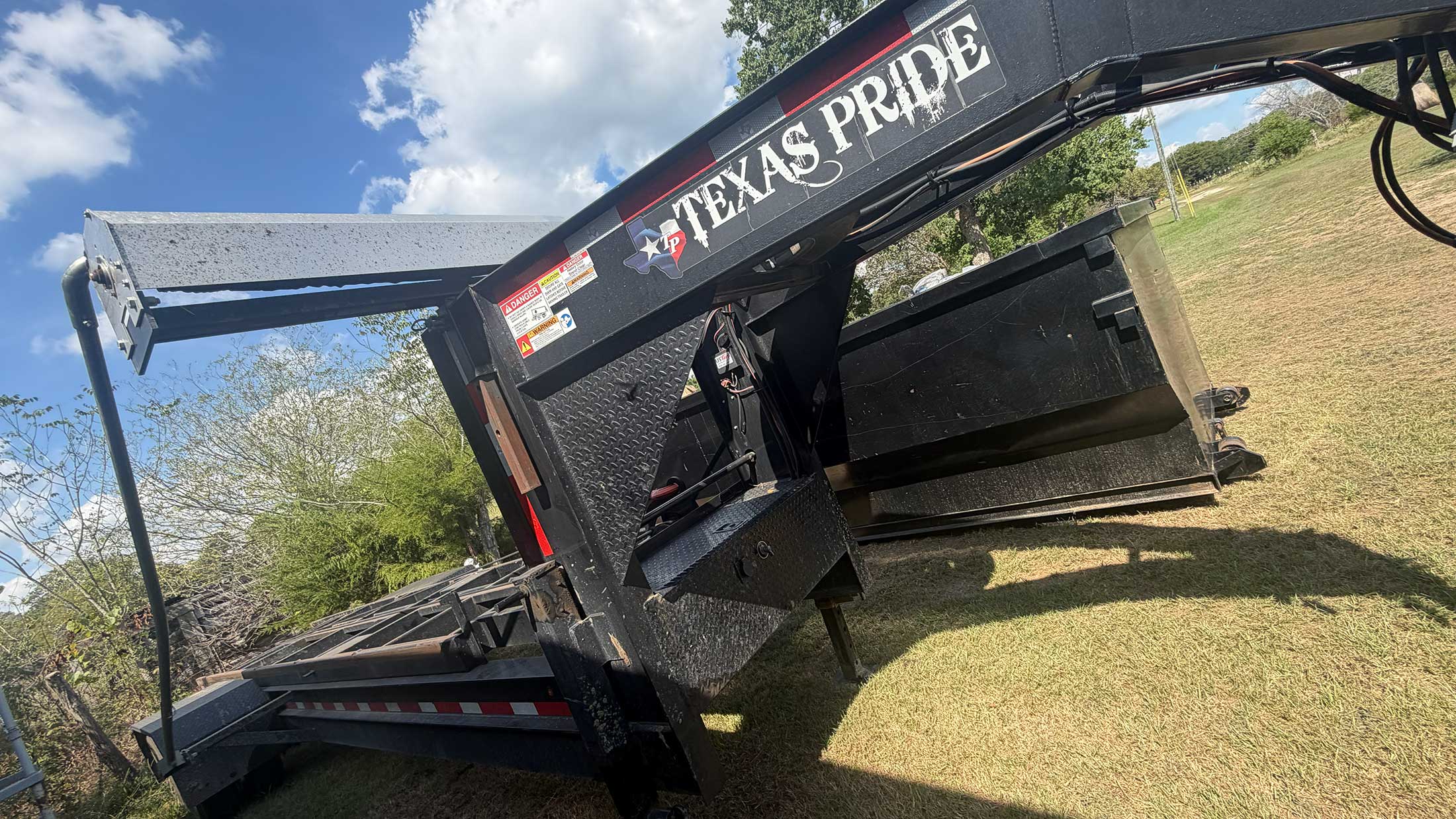 C3 Rentals roll-off dumpster delivery equipment serving Crockett, Texas