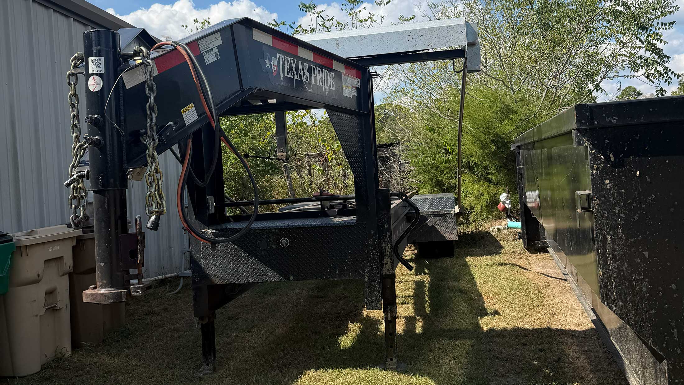 Roll-off dumpster equipment used for C3 Rentals deliveries near Athens, Texas